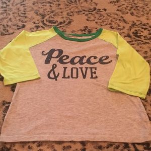 Gently used 3/4 sleeve Henley/ Peace & Love